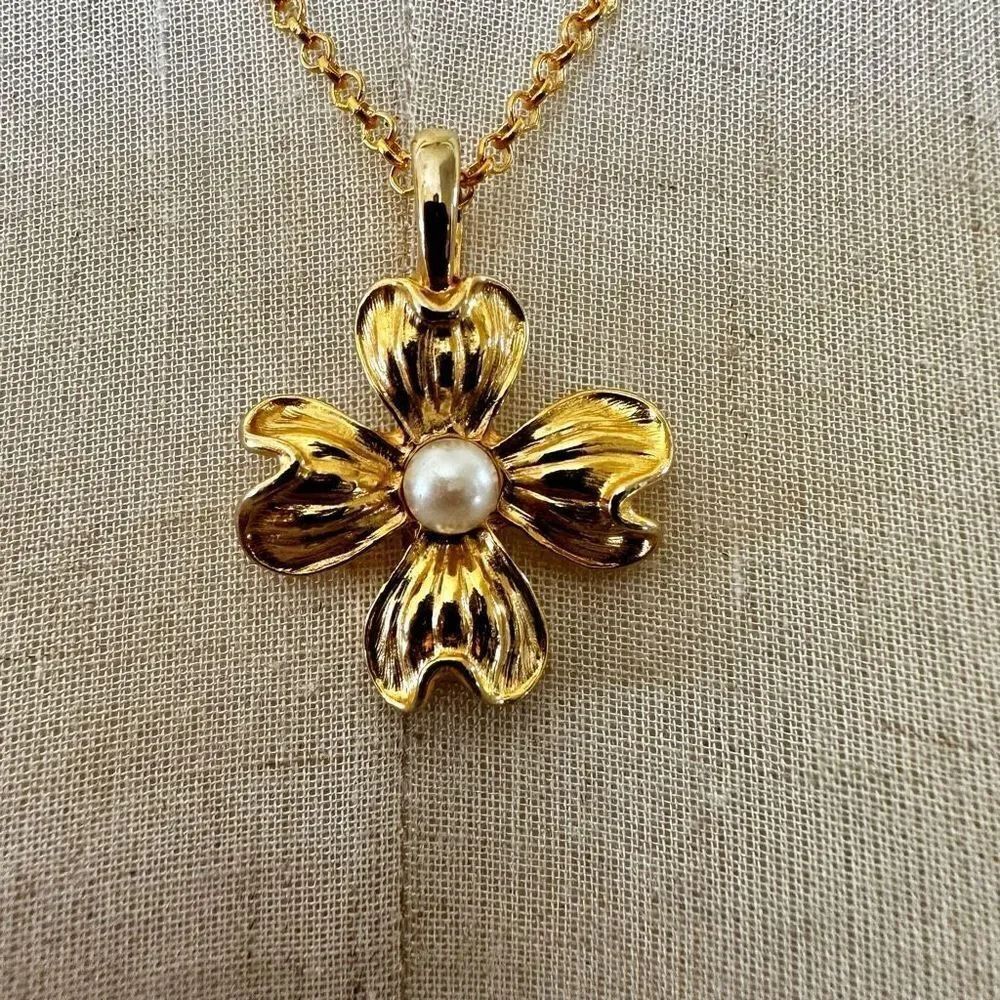 P.E.P. Gold tone flower pendant with faux pearl center